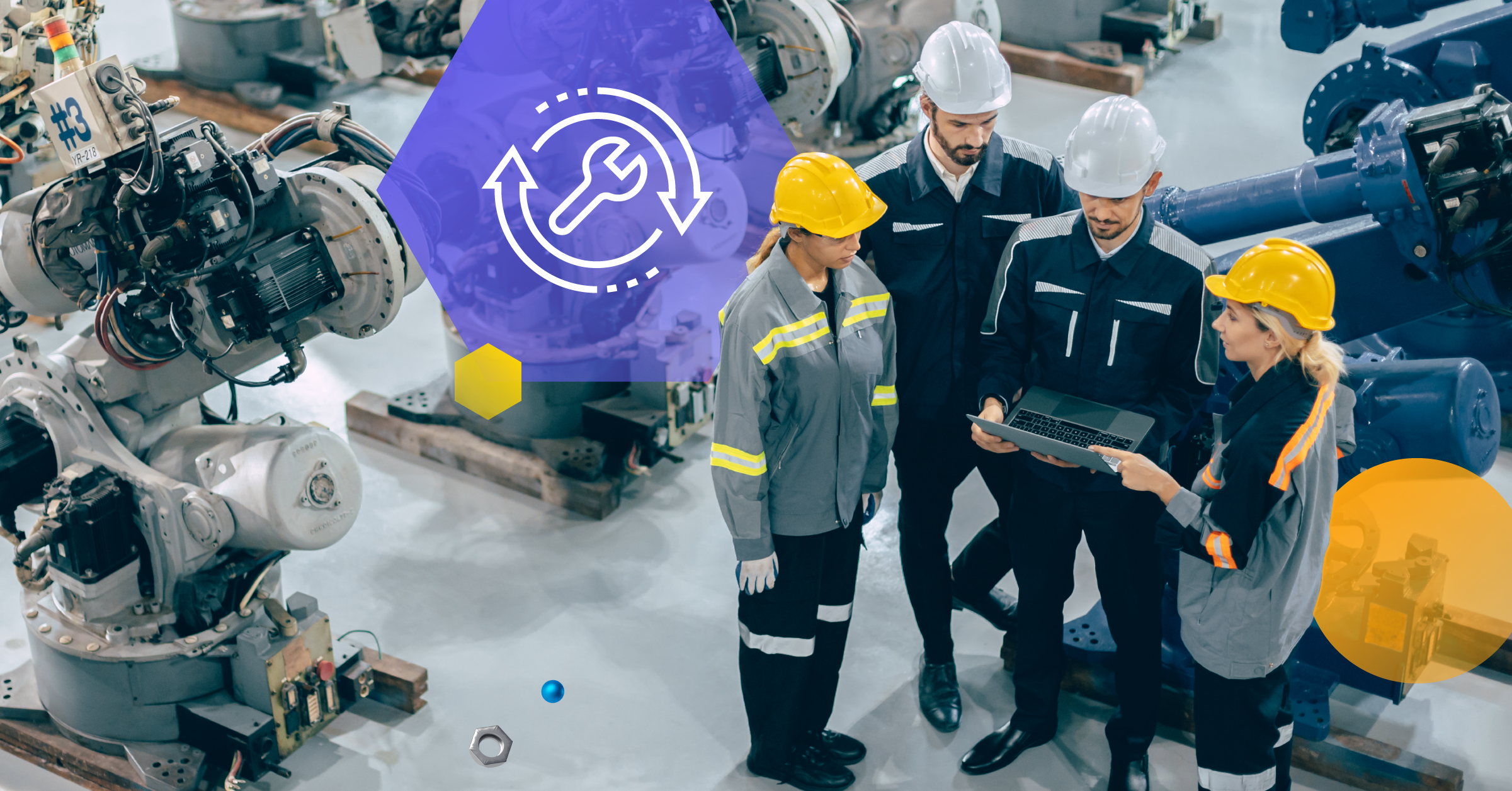 Team of four maintenance workers looking at a laptop